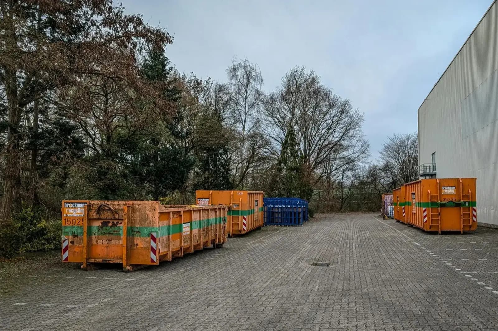 Roll-off dumpster fleet at a Canadian depot — 10, 14, 20, 30, 40-yard sizes